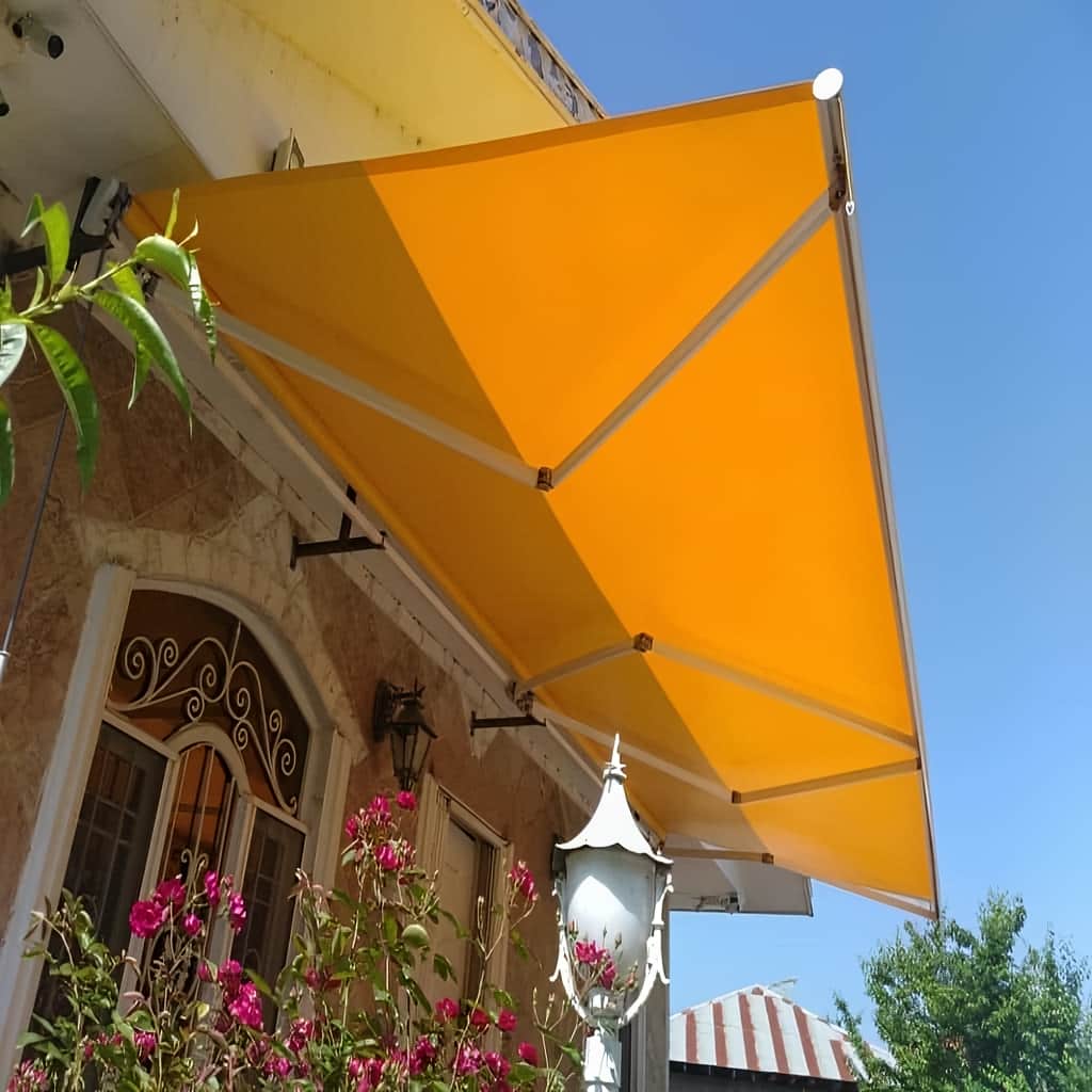 سایبان برقی با پارچه آب گریز بارانی سایبان برقی با پارچه آب گریز بارانی