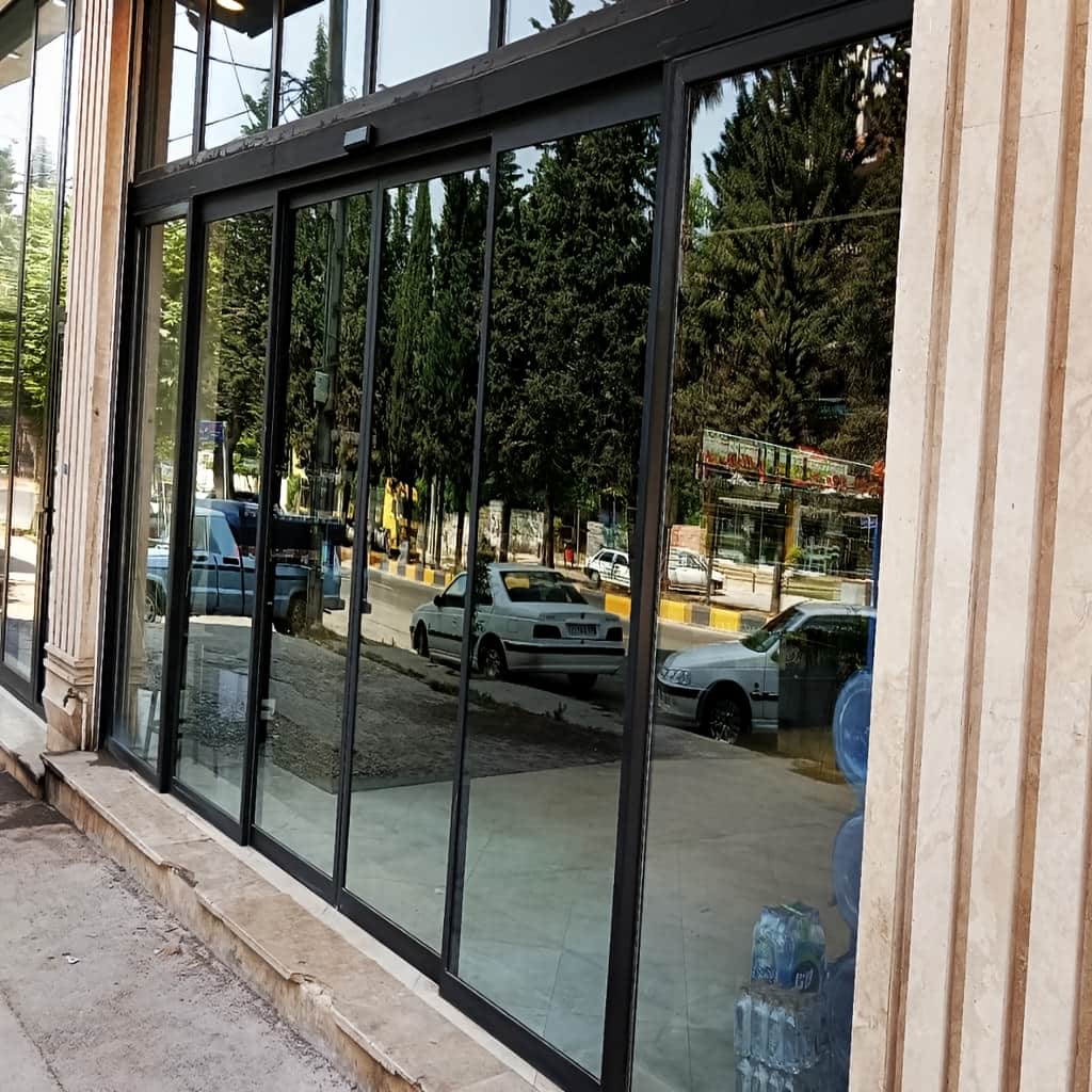 درب شیشه ای فریم لس تلسکوپی با شیشه سکوریت